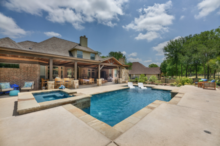 Pool chairs in pool.