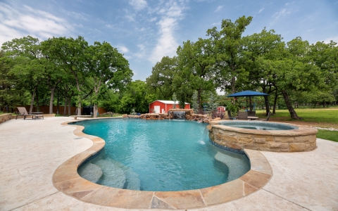 Pool with rock waterfall.