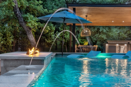 Pool with water spraying into it.