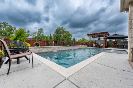 geometric pool with seating.