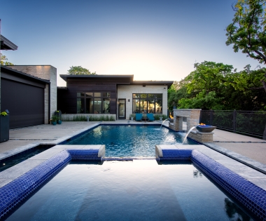 Pool with free flowing water and jacuzzi.