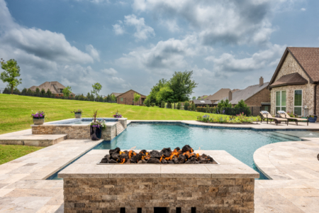 Fire pit by pool.