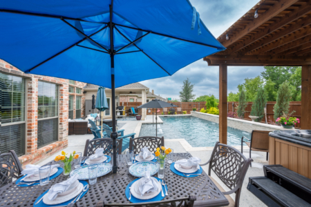 Outdoor seating area by pool.