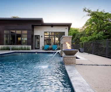 Pool with free flowing water and fire.