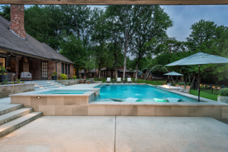Pool with outdoor seating area.