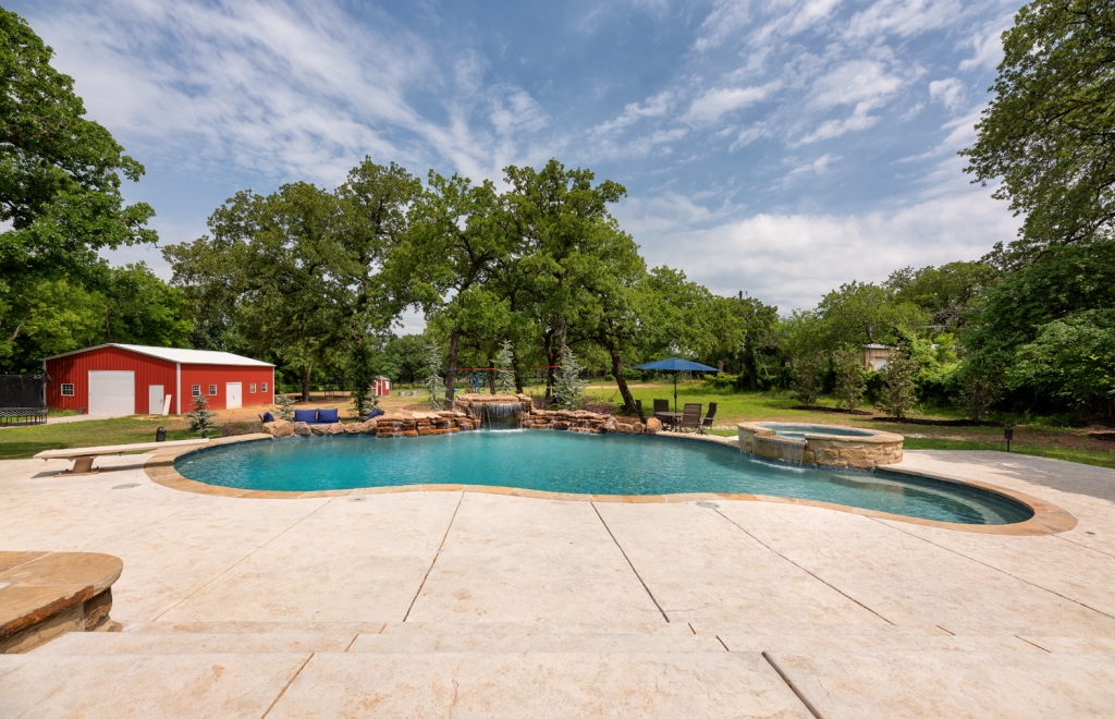 swimming pool with stone deck