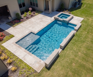 swimming pool with paving deck.
