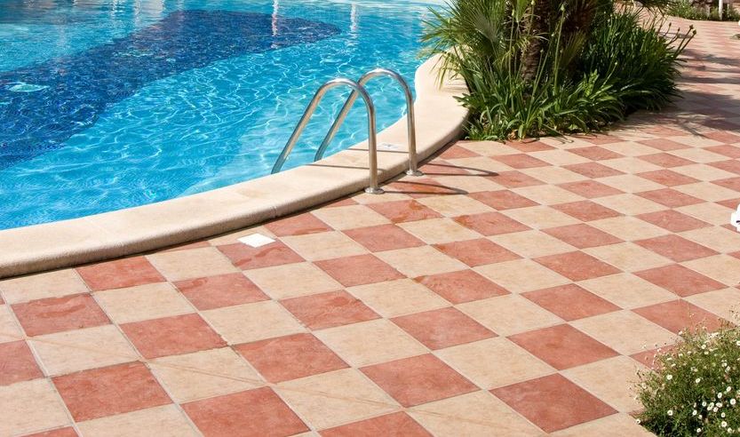 Swimming pool with a tile deck