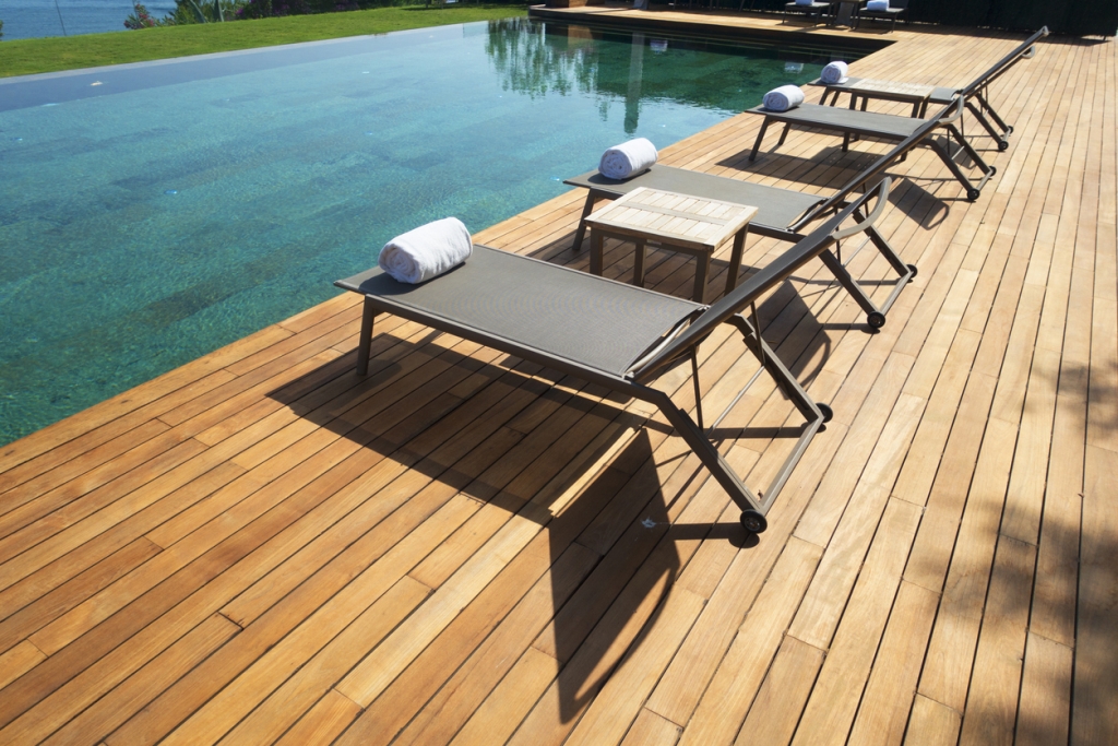swimming pool with a wooden deck