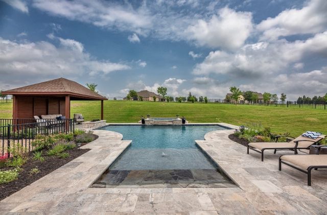 Happy Monday!
Showing off this large gorgeous geometric pool that includes a beach entry, spa, fire pit, and outdoor living structure, that created a comprehensive and inviting outdoor oasis! This design offers a range of amenities and features that cater to relaxation, entertainment, and enjoyment, ensuring that the homeowners can fully embrace the benefits of outdoor living! 💦

Designer:  Nicklaus Farricy
Project Manager: Brian Crystal